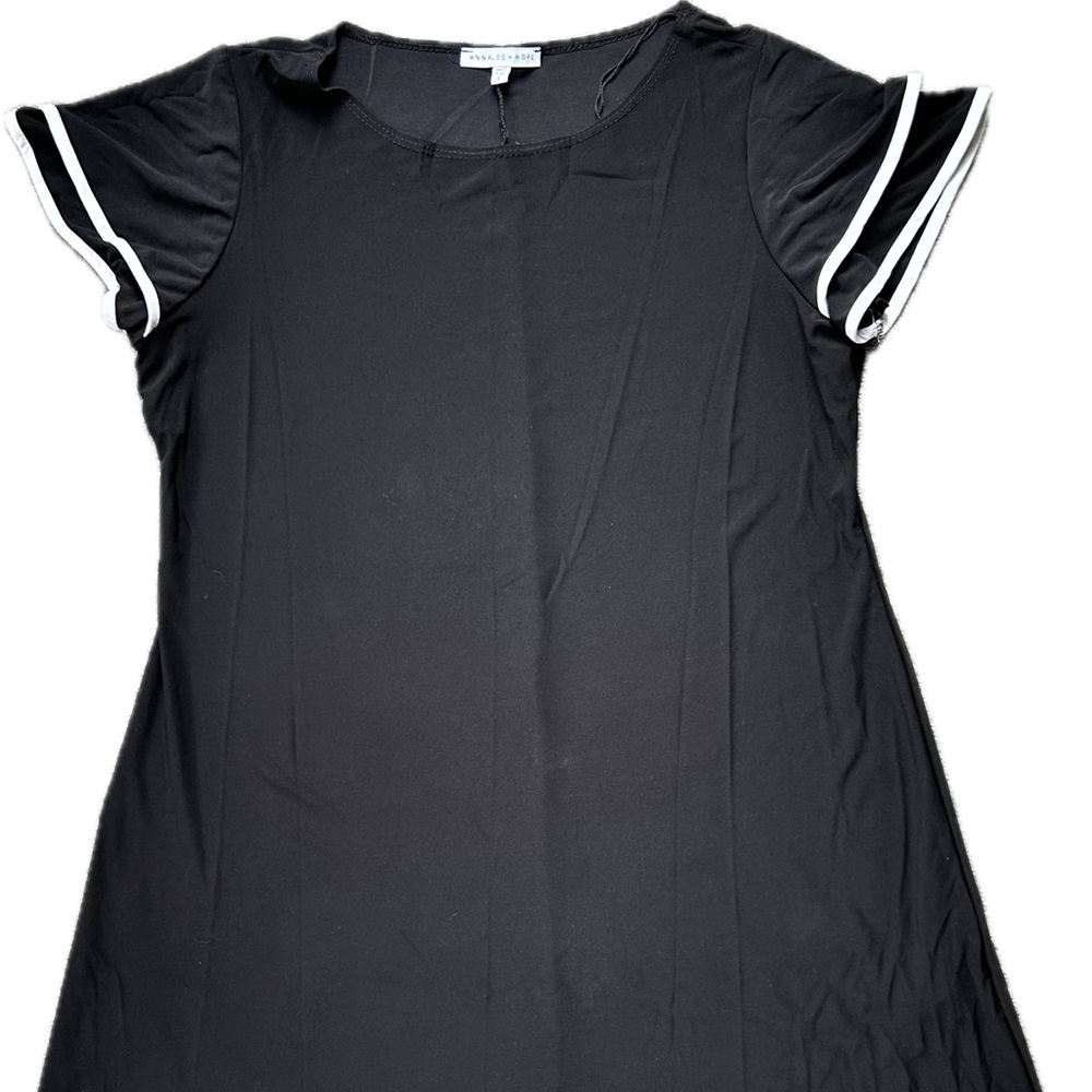 A-line black dress with white trimmed flutter sleeves